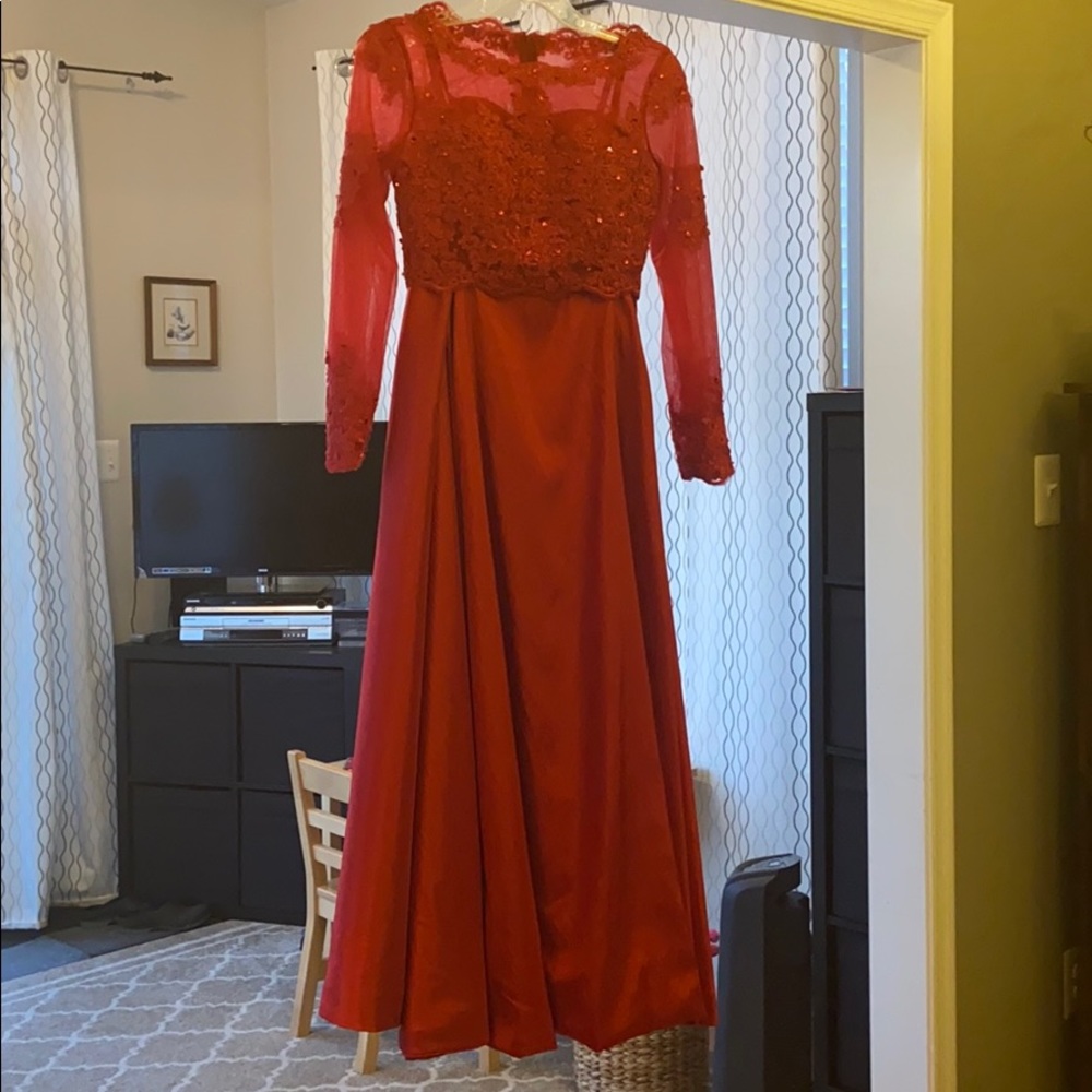 Red, long sleeved prom dress